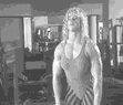 The barbell pulls towards your chin